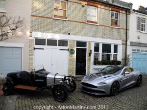 Two Aston Martins photographed at Henniker Mews on the exact day that Aston Martin became 100 years old